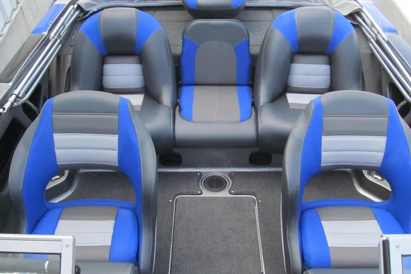 Slide: The Image of 2026 Ranger 212LS boat interior with blue and gray seating arrangement. - 14