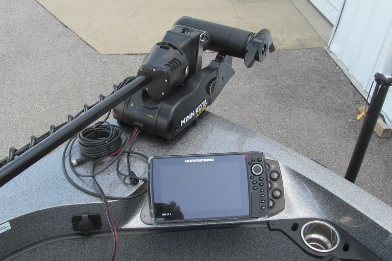 Slide: The Image of 2026 Ranger 212LS boat with Minn Kota trolling motor and Humminbird Helix 9 fish finder. - 9