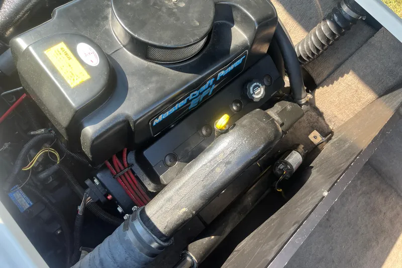 Slide: The Image of Engine compartment of a 1996 MasterCraft MariStar 210 VRS boat. - 15