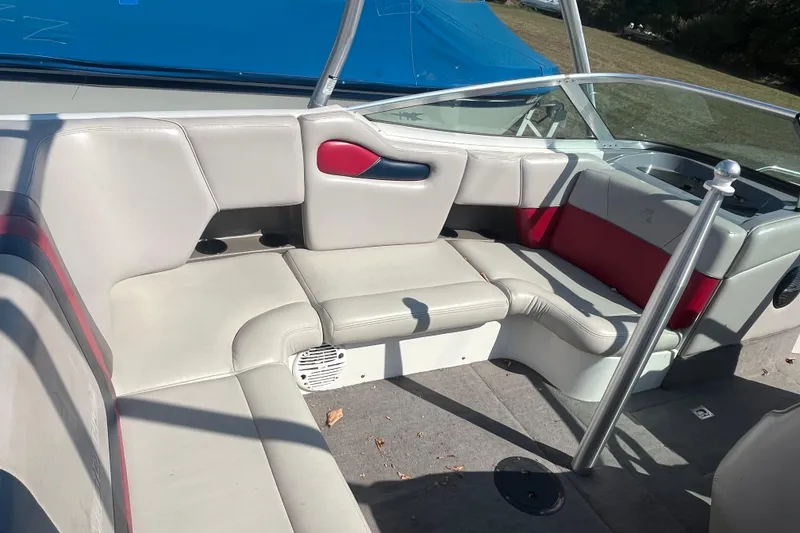 Slide: The Image of 1996 MasterCraft MariStar 210 VRS boat interior with white and red seating. - 9