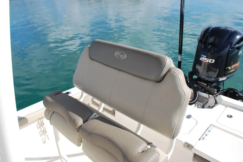 Slide: The Image of 2021 Key West 210 Bay Reef boat with Yamaha 250 engine on calm water. - 15
