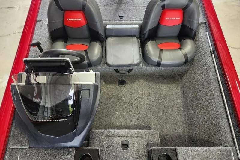 Slide: The Image of 2025 Tracker Pro Team 175 boat interior with dual seats and steering console. - 9