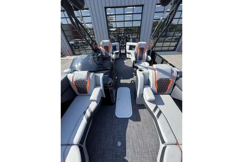 Slide: The Image of 2026 Godfrey XP 2700 TWIN boat interior with modern seating and sleek design. - 15