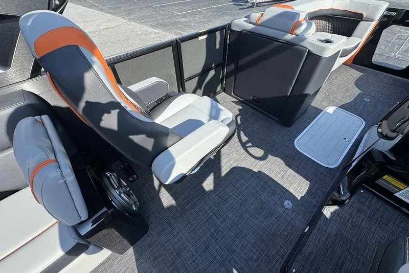 Slide: The Image of Interior of 2026 Godfrey XP 2700 TWIN boat with modern seating and flooring. - 17