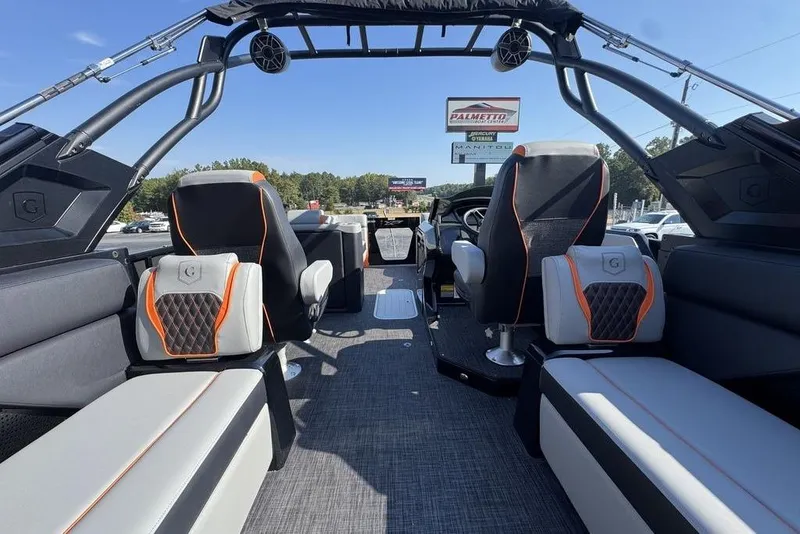 Slide: The Image of Interior of 2026 Godfrey XP 2700 TWIN boat with modern seating and sleek design. - 28