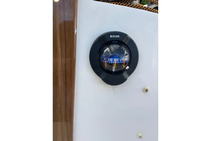 Slide: The Image of Ritchie compass on 2012 Alerion Express 28 sailboat dashboard. - 14