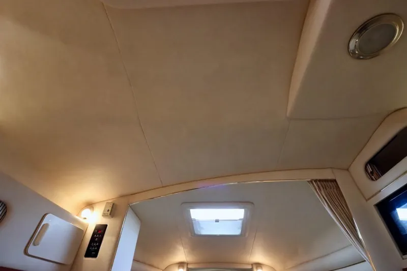 Slide: The Image of Interior ceiling of 2000 Sea Ray 270 Sundancer boat with lighting and hatch. - 28