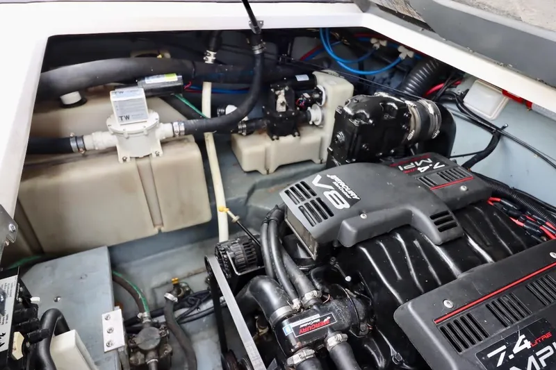 Slide: The Image of Engine compartment of a 2000 Sea Ray 270 Sundancer with Mercury V8 engine. - 29
