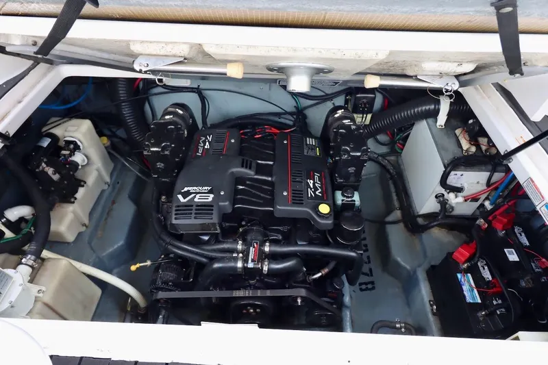 Slide: The Image of Engine compartment of a 2000 Sea Ray 270 Sundancer with a Mercury V8 engine. - 30