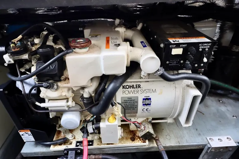 Slide: The Image of Engine compartment of a 2000 Sea Ray 270 Sundancer with Kohler power system. - 31