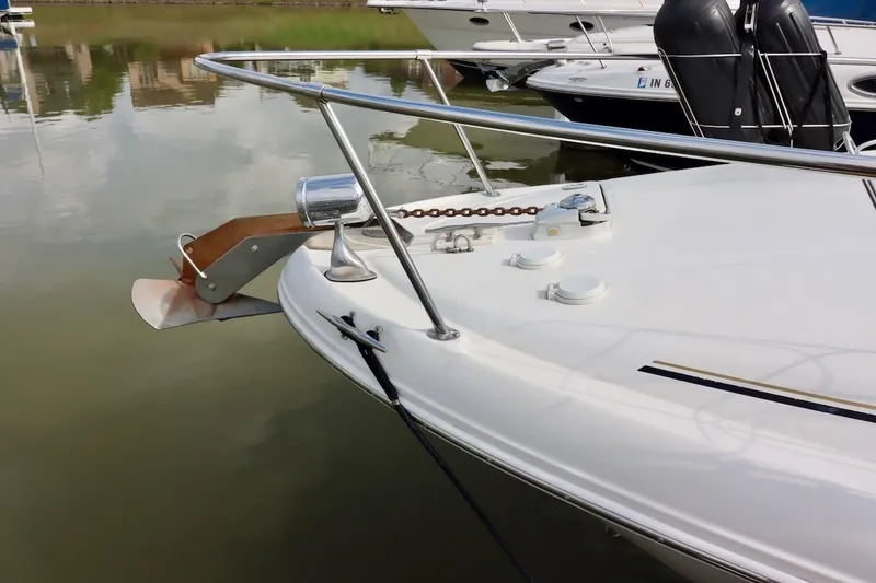 Slide: The Image of Bow of 2000 Sea Ray 270 Sundancer with anchor and railing in marina. - 4