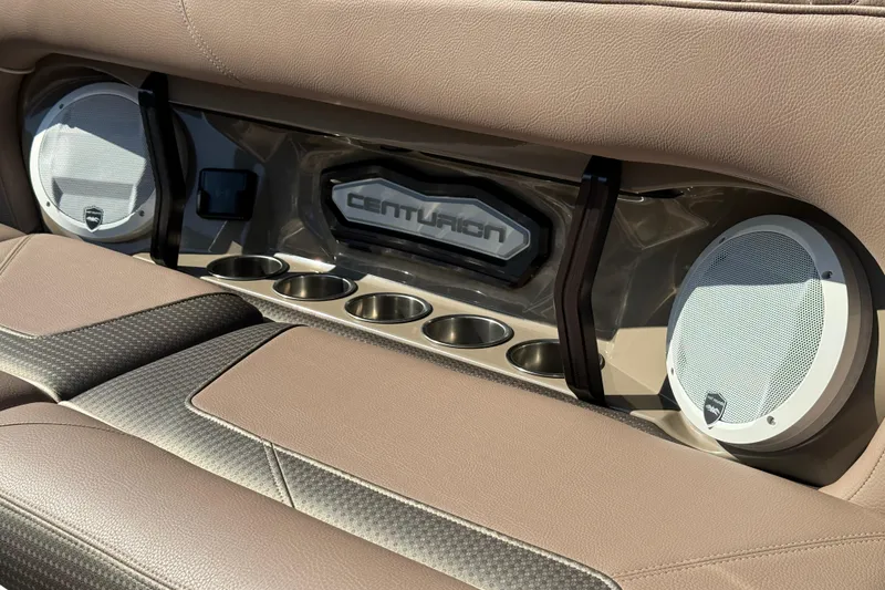 Slide: The Image of Luxurious interior of 2025 Centurion Ri245 boat with speakers and cup holders. - 17