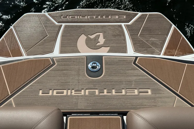 Slide: The Image of 2025 Centurion Ri245 boat deck with stylish brown and beige design. - 18
