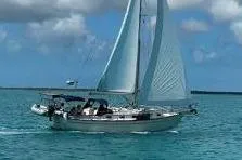 The Image of 1997 Island Packet 37 sailboat on open sea. - 0