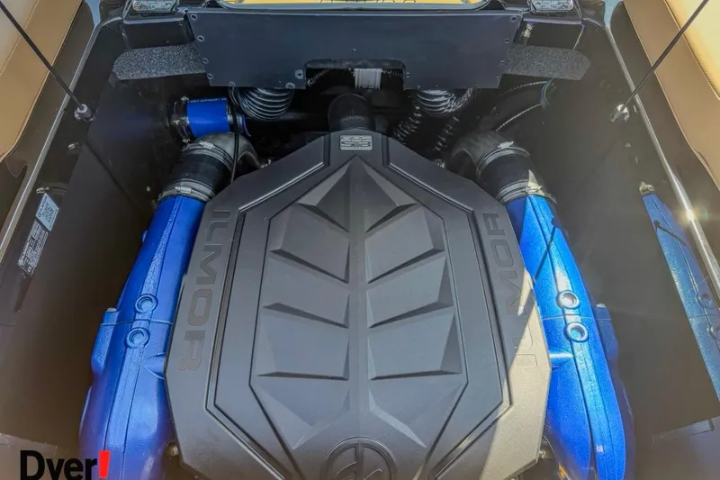 Slide: The Image of 2026 MasterCraft NXT23 engine compartment with Ilmor branding and blue components. - 15