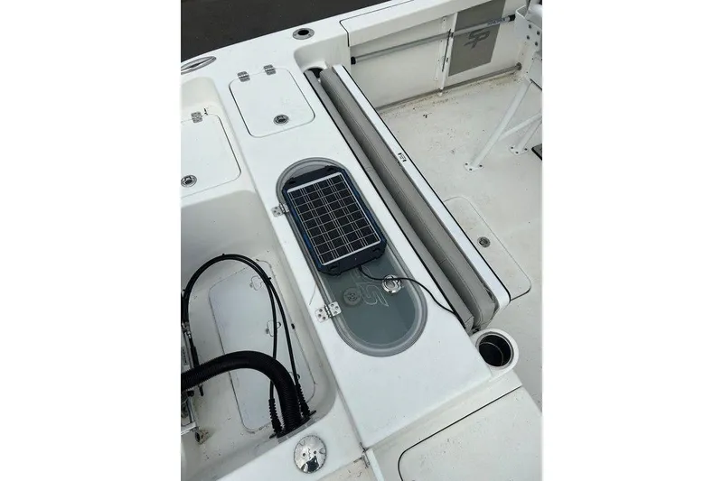 Slide: The Image of 2019 Sea Pro 219 boat deck with solar panel and storage compartments. - 10