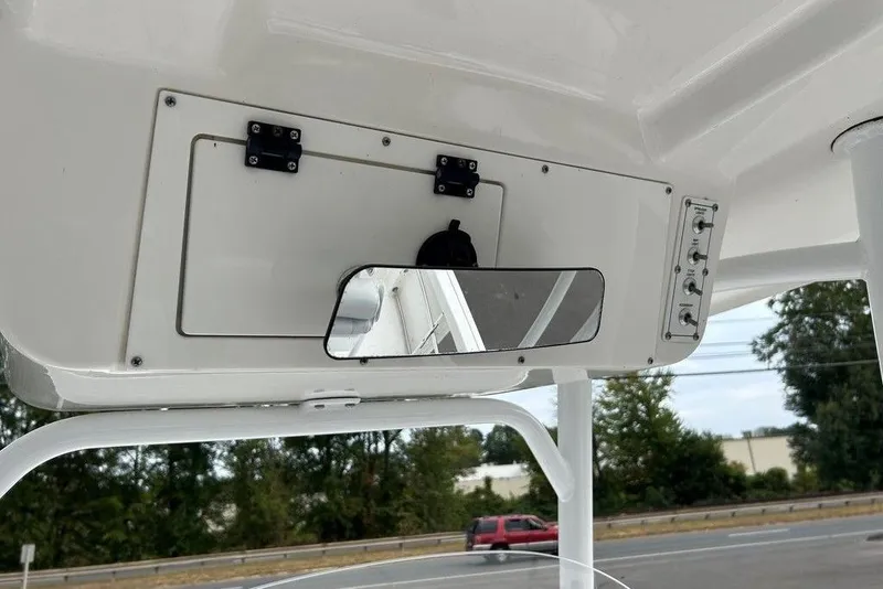 Slide: The Image of 2019 Sea Pro 219 boat console with mirror and control panel. - 23