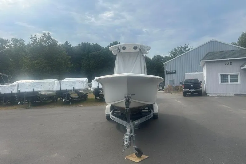 Slide: The Image of 2019 Sea Pro 219 boat on trailer in dealership lot. - 35