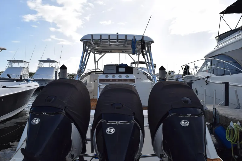Slide: The Image of Triple outboard motors on a 2008 Hydra-Sports Vector 3300 VX boat. - 10