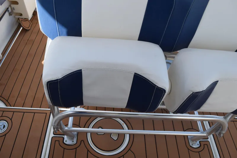 Slide: The Image of 2008 Hydra-Sports Vector 3300 VX boat dashboard with controls and navigation equipment. - 109