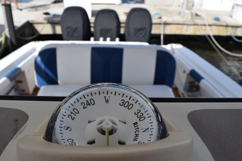 Slide: The Image of 2008 Hydra-Sports Vector 3300 VX interior with cup holders and teak flooring. - 117