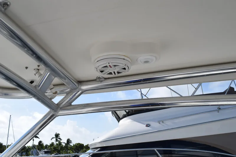 Slide: The Image of 2008 Hydra-Sports Vector 3300 VX boat interior with blue and white seating, wooden flooring. - 124