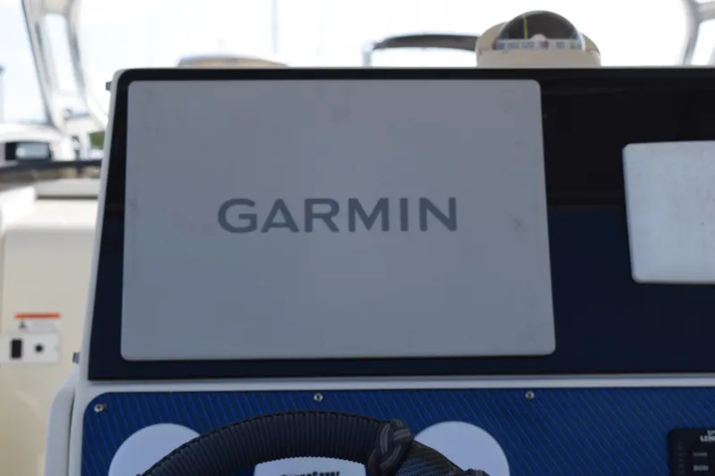 Slide: The Image of 2008 Hydra-Sports Vector 3300 VX boat interior with white and blue seating. - 129