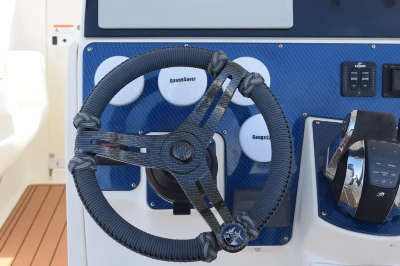 Slide: The Image of 2008 Hydra-Sports Vector 3300 VX boat interior at marina, featuring sleek seating and railing. - 130