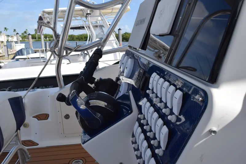 Slide: The Image of 2008 Hydra-Sports Vector 3300 VX in marina, surrounded by various boats under a clear sky. - 133