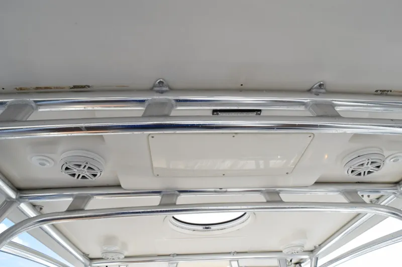 Slide: The Image of 2008 Hydra-Sports Vector 3300 VX boat deck with hatch, railing, and water view. - 143