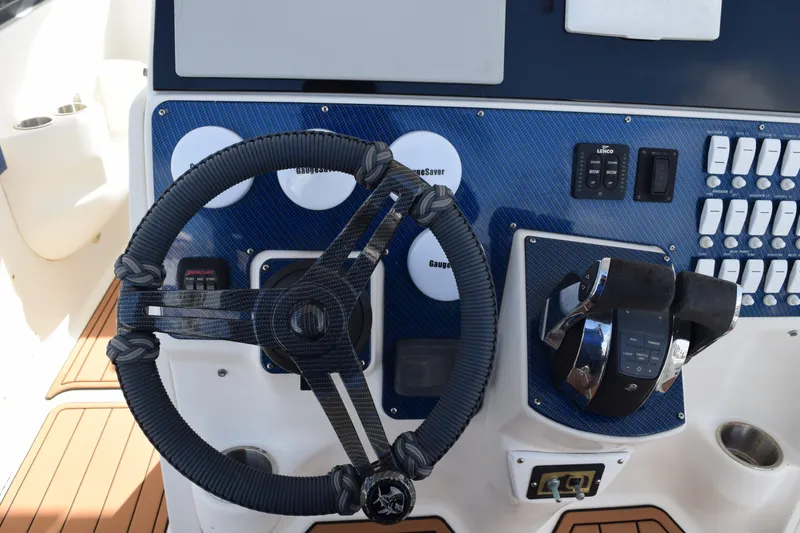 Slide: The Image of 2008 Hydra-Sports Vector 3300 VX boat deck with hatch, featuring sleek white design. - 144