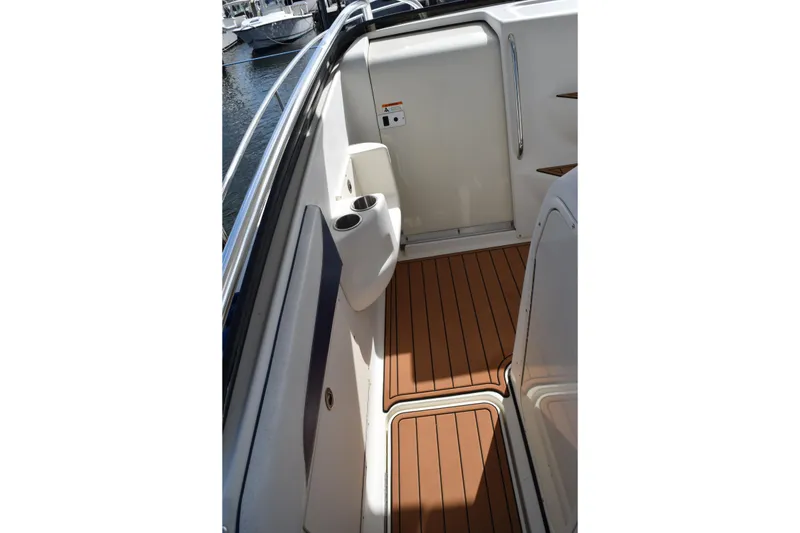 Slide: The Image of 2008 Hydra-Sports Vector 3300 VX boat with spotlight and speaker on deck. - 146