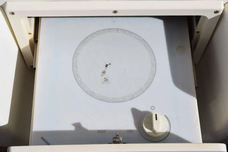 Slide: The Image of 2008 Hydra-Sports Vector 3300 VX boat deck with textured surface and metal fittings. - 157