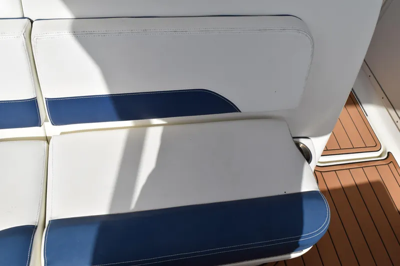 Slide: The Image of 2008 Hydra-Sports Vector 3300 VX boat deck with stainless steel railing and wood finish. - 167