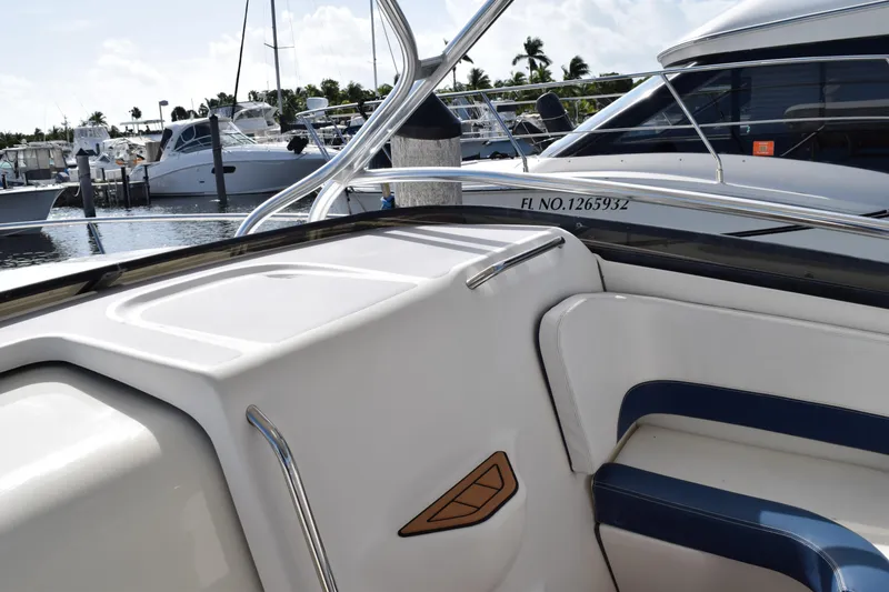 Slide: The Image of 2008 Hydra-Sports Vector 3300 VX boat docked at marina under blue sky. - 176