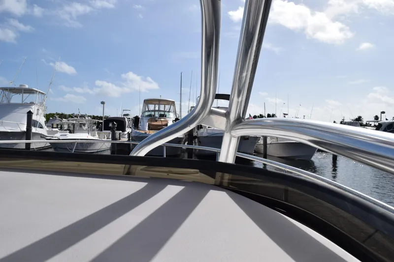 Slide: The Image of 2008 Hydra-Sports Vector 3300 VX docked at a marina with other boats. - 177