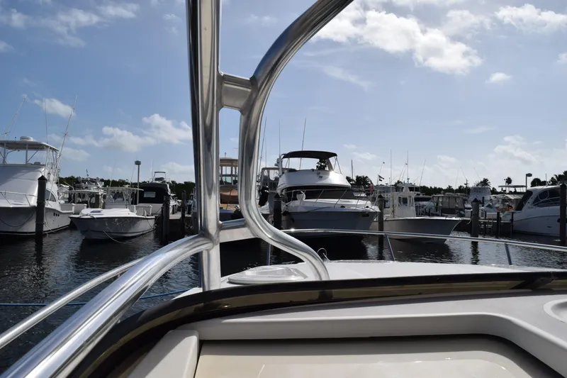 Slide: The Image of 2008 Hydra-Sports Vector 3300 VX boat detail with chrome fixture and clear sky background. - 179