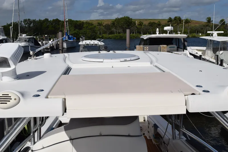 Slide: The Image of 2008 Hydra-Sports Vector 3300 VX boat interior with white upholstery and metal railing. - 193