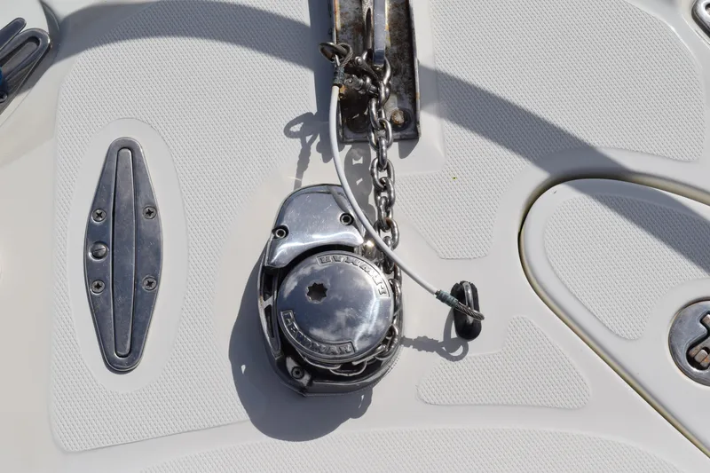 Slide: The Image of 2008 Hydra-Sports Vector 3300 VX boat interior with cushioned seating and steering wheel. - 200