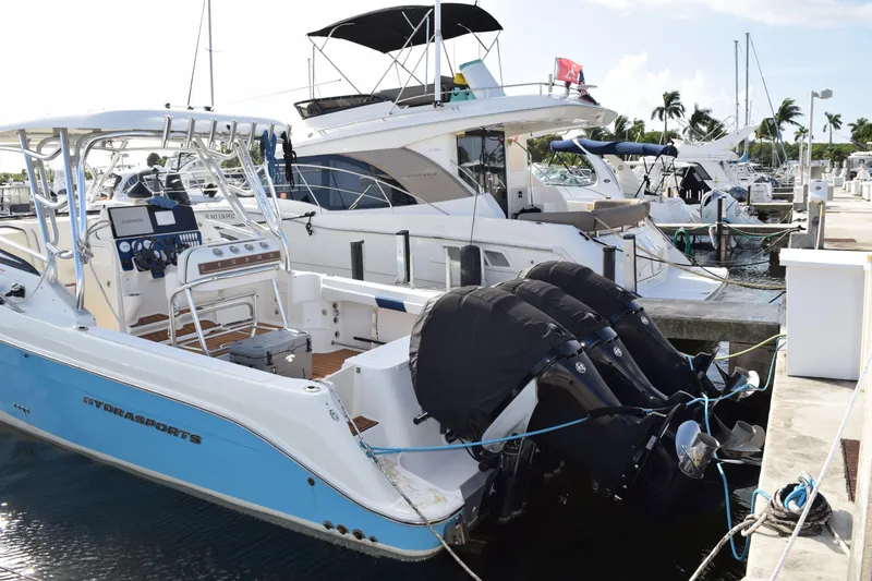 Slide: The Image of 2008 Hydra-Sports Vector 3300 VX boat deck with storage compartments and teak flooring. - 22