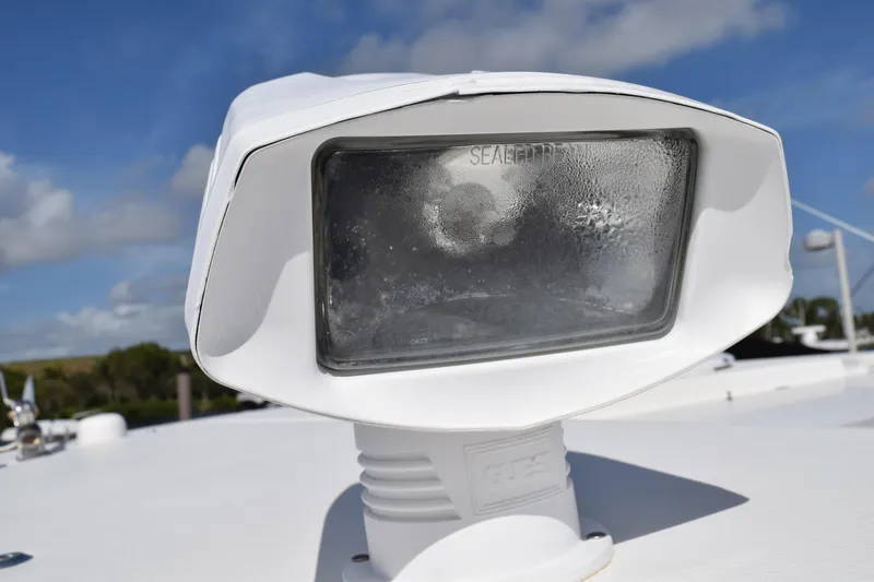 Slide: The Image of 2008 Hydra-Sports Vector 3300 VX boat docked at marina under clear blue sky. - 230