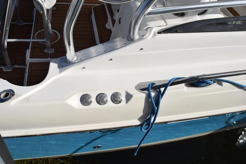 Slide: The Image of Coiled hose in storage compartment of 2008 Hydra-Sports Vector 3300 VX boat. - 25