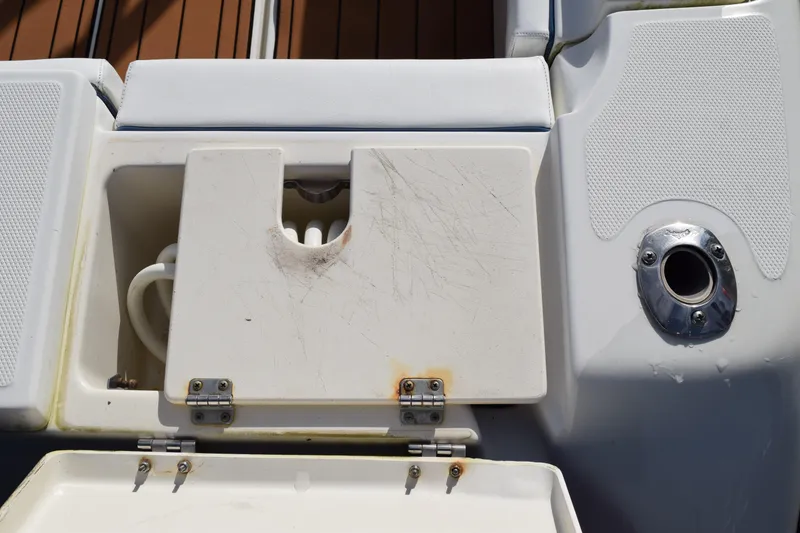 Slide: The Image of 2008 Hydra-Sports Vector 3300 VX boat deck with rod holders and storage compartment. - 29