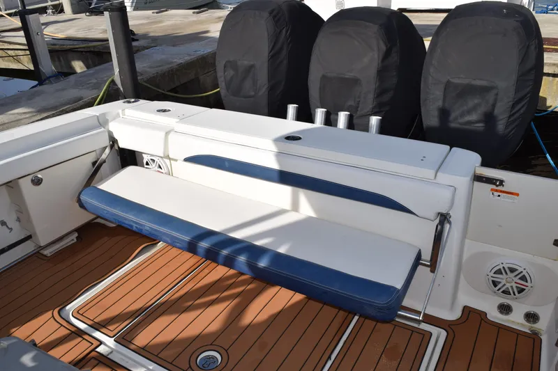 Slide: The Image of Open hatch of a 2008 Hydra-Sports Vector 3300 VX boat, revealing internal wiring and components. - 40