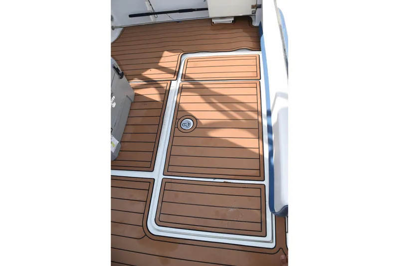 Slide: The Image of 2008 Hydra-Sports Vector 3300 VX engine compartment with wiring and components visible. - 42