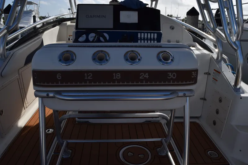 Slide: The Image of 2008 Hydra-Sports Vector 3300 VX boat interior with Garmin equipment, docked at marina. - 63