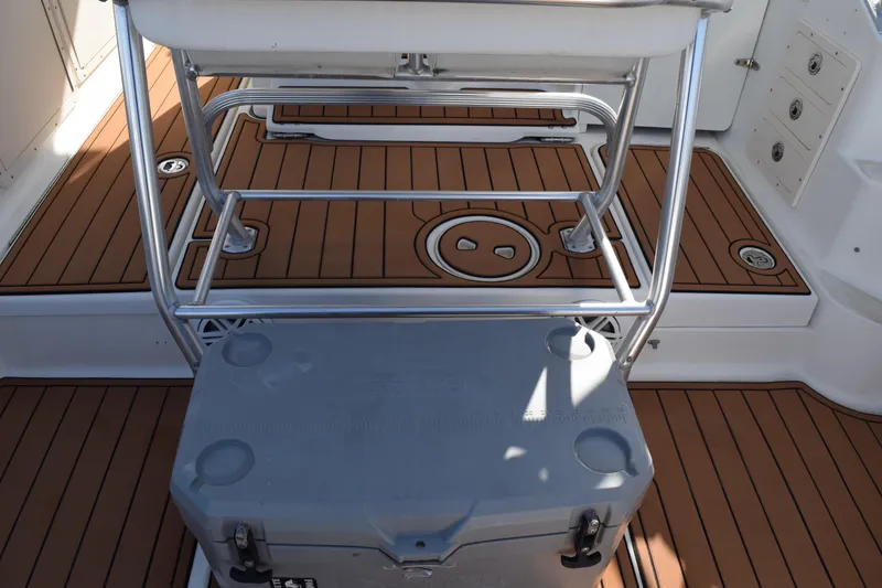 Slide: The Image of 2008 Hydra-Sports Vector 3300 VX boat interior with teak flooring and helm station. - 64