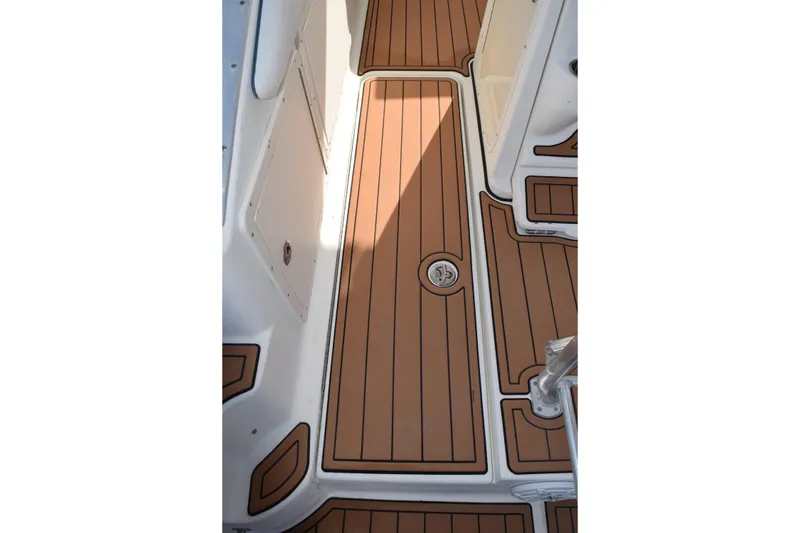 Slide: The Image of 2008 Hydra-Sports Vector 3300 VX boat docked at marina, featuring Garmin navigation system. - 72