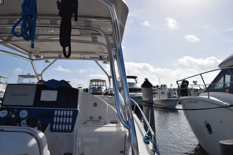 Slide: The Image of 2008 Hydra-Sports Vector 3300 VX boat deck with speakers and metal railing. - 78