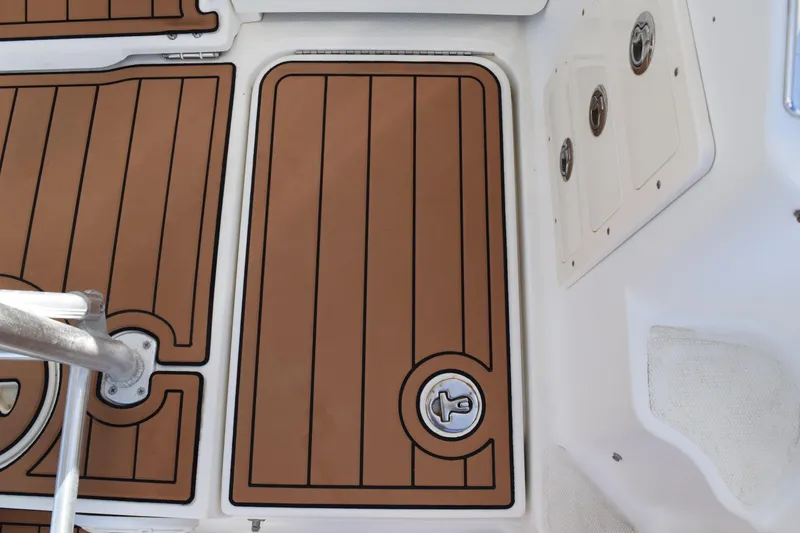 Slide: The Image of 2008 Hydra-Sports Vector 3300 VX boat interior with stainless steel framework and measurement markings. - 80